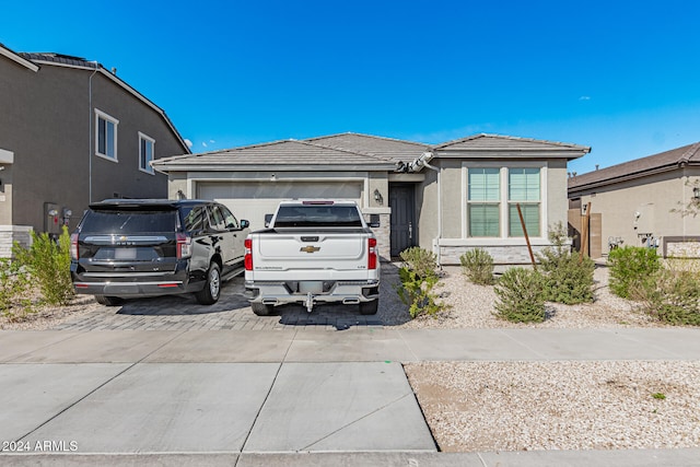 view of front of home with a garage