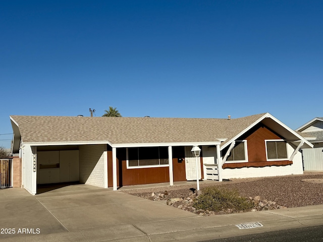 single story home with a carport