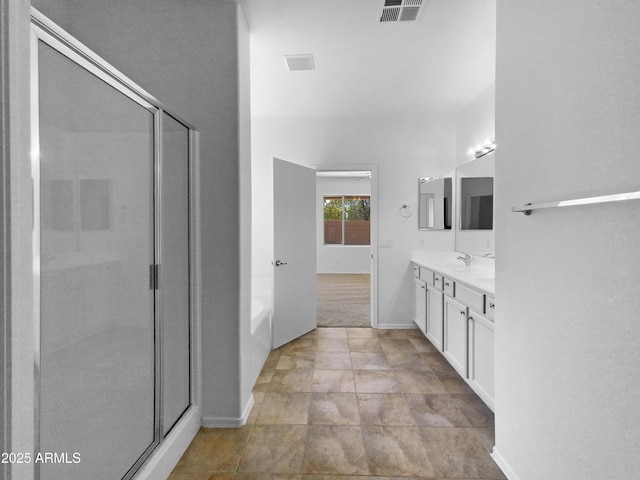 bathroom with separate shower and tub and vanity