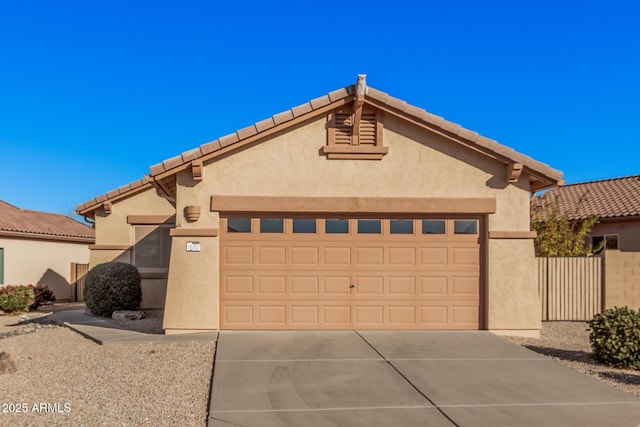 view of front of home with a garage