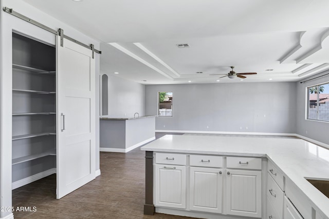 24615 S 182nd Pl, Gilbert, AZ 85298 - kitchen featuring ceiling fan, a barn door, plenty of natural light, white cabinets, and recessed lighting