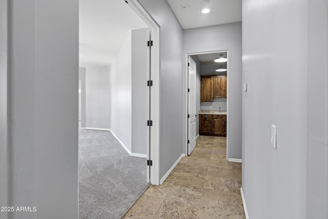 24615 S 182nd Pl, Gilbert, AZ 85298 - hallway with light colored carpet and light stone finish floors