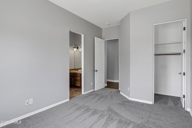 24615 S 182nd Pl, Gilbert, AZ 85298 - unfurnished bedroom with carpet, a walk in closet, a closet, and connected bathroom