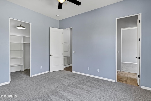 24615 S 182nd Pl, Gilbert, AZ 85298 - unfurnished bedroom featuring carpet floors, a spacious closet, ceiling fan, and a closet