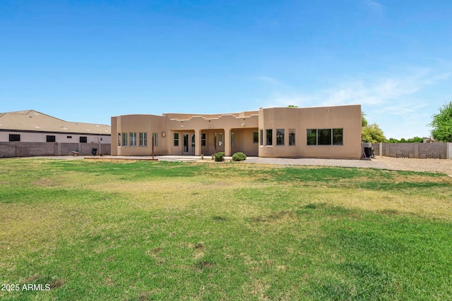 24615 S 182nd Pl, Gilbert, AZ 85298 - back of property with stucco siding, a fenced backyard, and a patio area