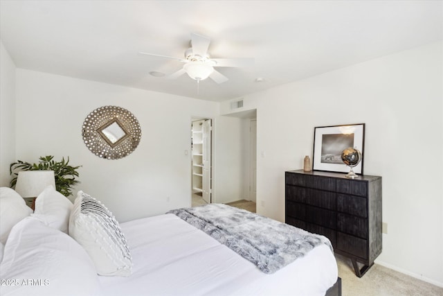 8405 E San Pedro Dr, Scottsdale, AZ 85258 - bedroom with light carpet, baseboards, and ceiling fan