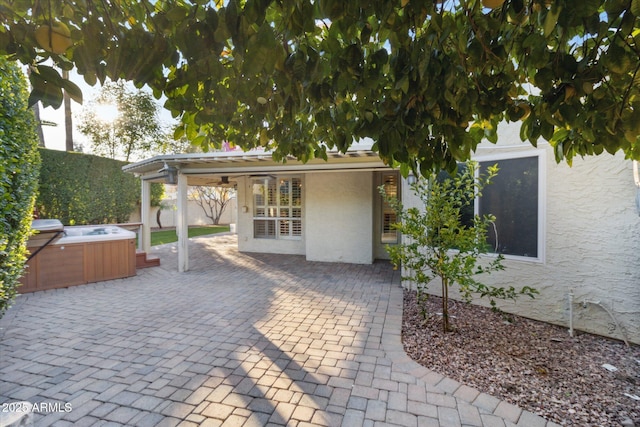 8405 E San Pedro Dr, Scottsdale, AZ 85258 - view of patio featuring a hot tub and fence