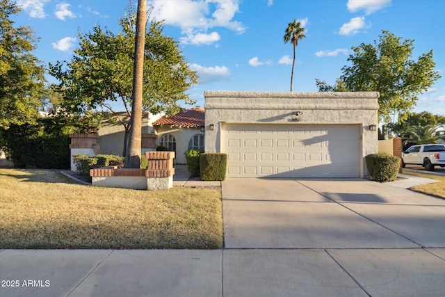 8405 E San Pedro Dr, Scottsdale, AZ 85258 - view of front facade featuring a garage, concrete driveway, stucco siding, and a tiled roof