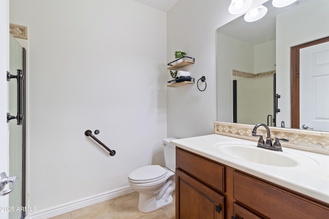 bathroom featuring tile patterned flooring, vanity, toilet, and an enclosed shower