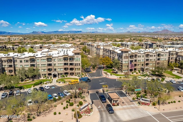 bird's eye view with a mountain view