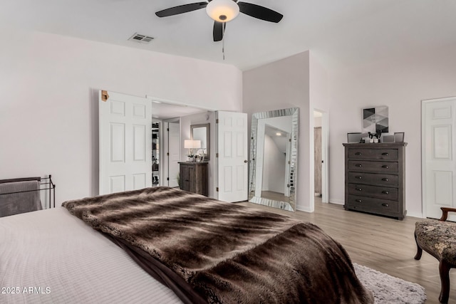 bedroom featuring ceiling fan and light wood-type flooring