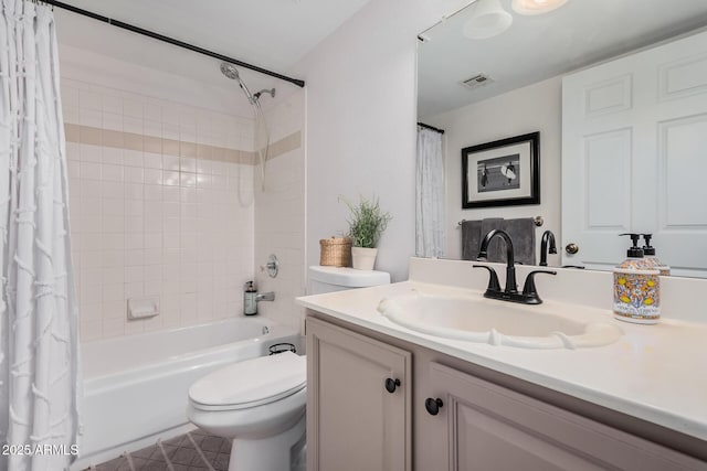 full bathroom featuring vanity, toilet, and shower / bath combo with shower curtain