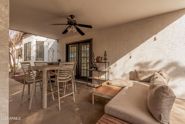 view of patio / terrace featuring ceiling fan