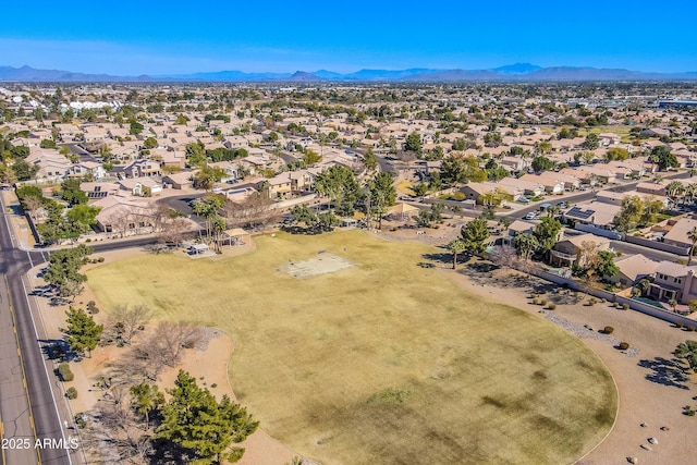 birds eye view of property featuring a residential view and a mountain view