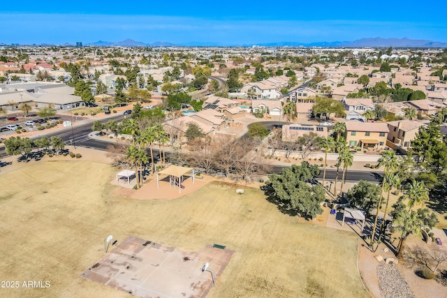 bird's eye view featuring a residential view and a mountain view