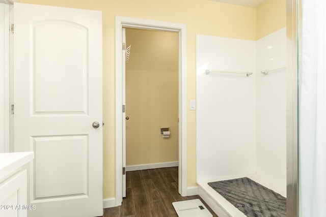 mudroom with dark wood-type flooring