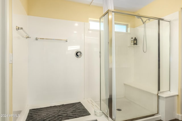 bathroom with walk in shower