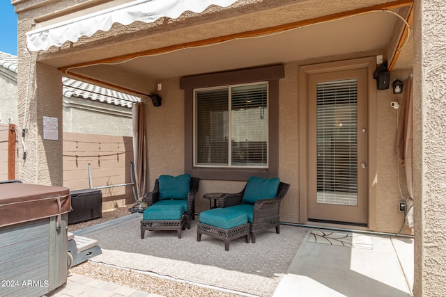 view of patio / terrace featuring a hot tub