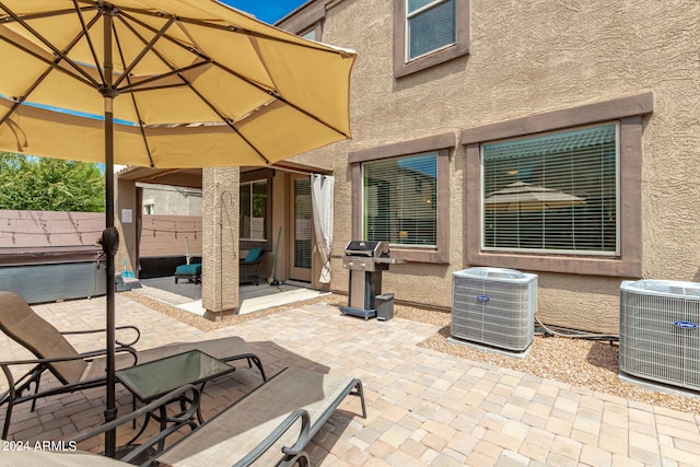 view of patio featuring grilling area and central AC