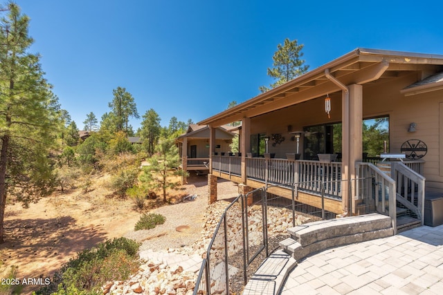 view of yard with a patio and a deck