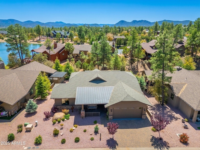 aerial view featuring a residential view and a water and mountain view