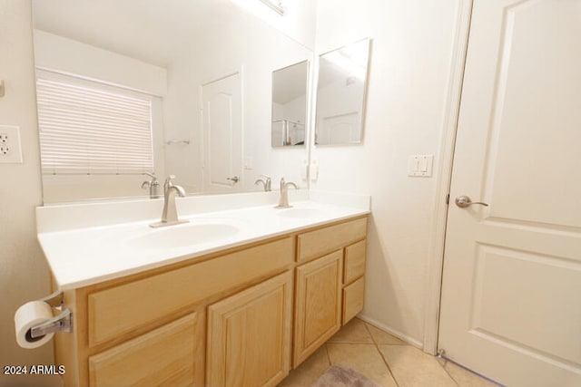 bathroom featuring tile patterned floors and vanity