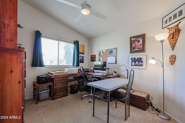 carpeted office space featuring ceiling fan and lofted ceiling