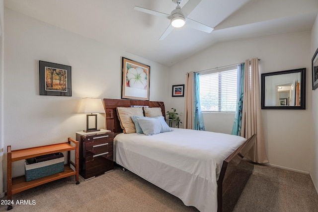 bedroom featuring vaulted ceiling, carpet, and ceiling fan