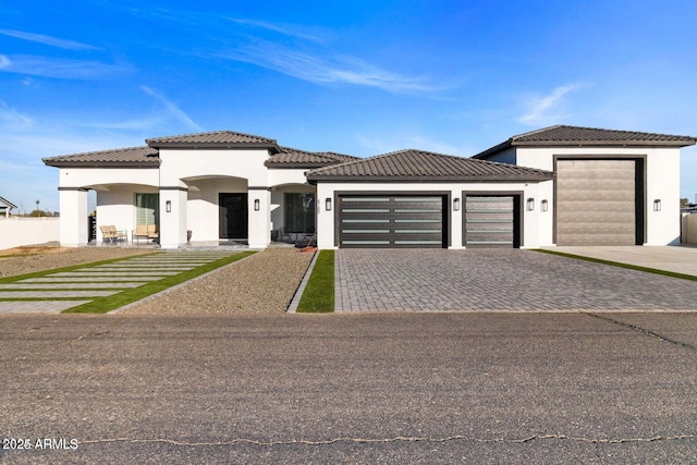 view of front of property featuring a garage