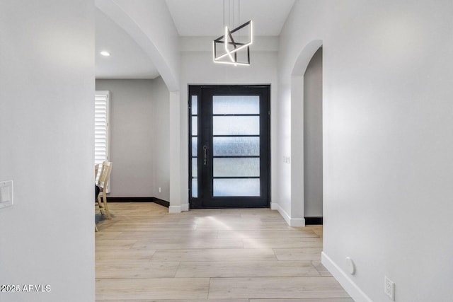 foyer entrance featuring light hardwood / wood-style flooring