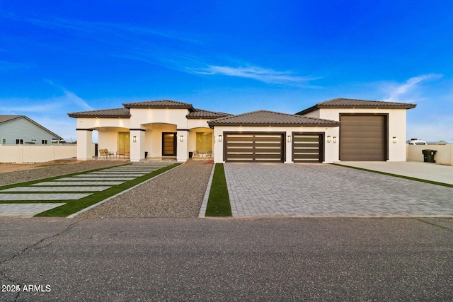 view of front of property featuring a garage