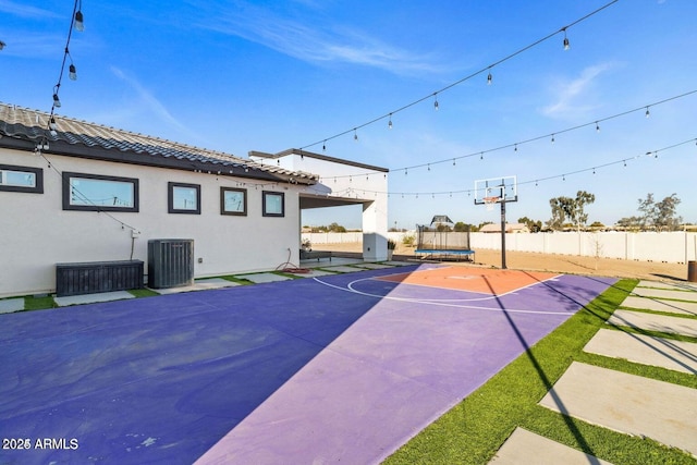 view of sport court with a trampoline