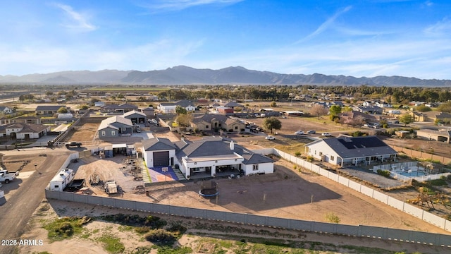 drone / aerial view featuring a mountain view