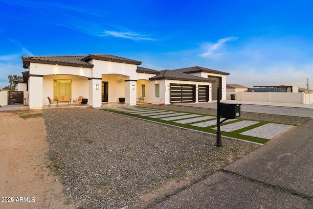 view of front of property with a garage