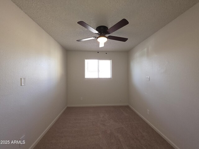 720 S Dobson Rd Unit 24, Mesa, AZ 85202 - spare room with baseboards, a ceiling fan, carpet, and a textured ceiling