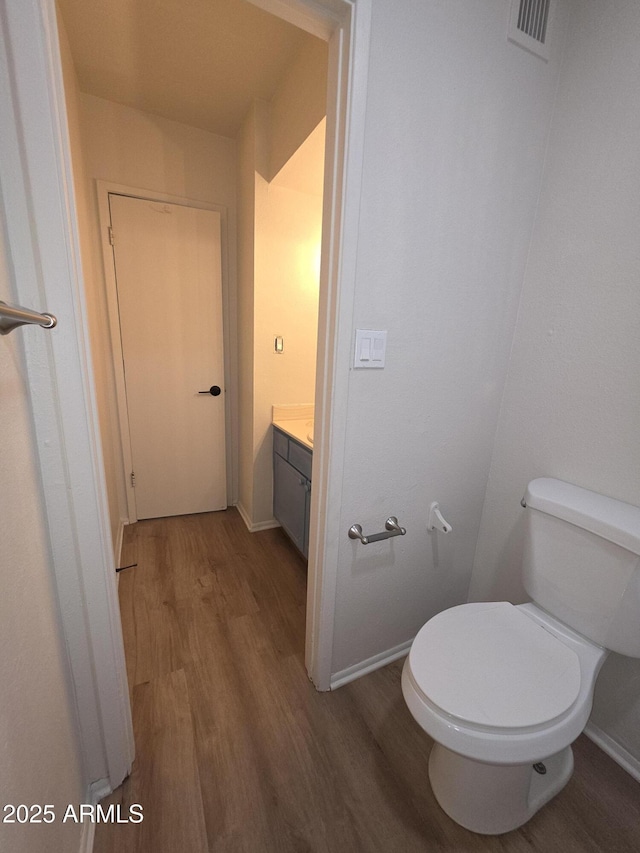720 S Dobson Rd Unit 24, Mesa, AZ 85202 - bathroom with toilet, wood finished floors, vanity, and visible vents