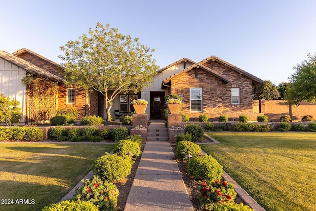 craftsman-style home featuring a front yard