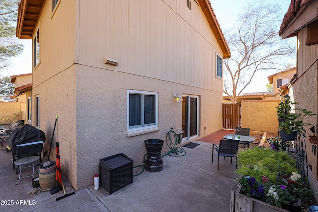 back of property with a patio area