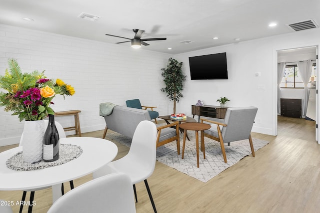 3139 N 40th St, Phoenix, AZ 85018 - dining area with light wood-type flooring, a ceiling fan, baseboards, and recessed lighting