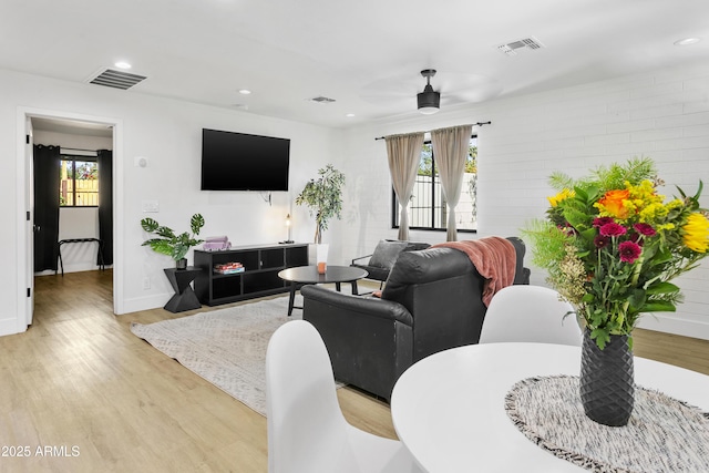 3139 N 40th St, Phoenix, AZ 85018 - living room with ceiling fan, light wood-style flooring, plenty of natural light, baseboards, and recessed lighting