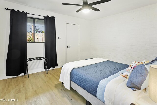3139 N 40th St, Phoenix, AZ 85018 - bedroom with light wood-type flooring and ceiling fan