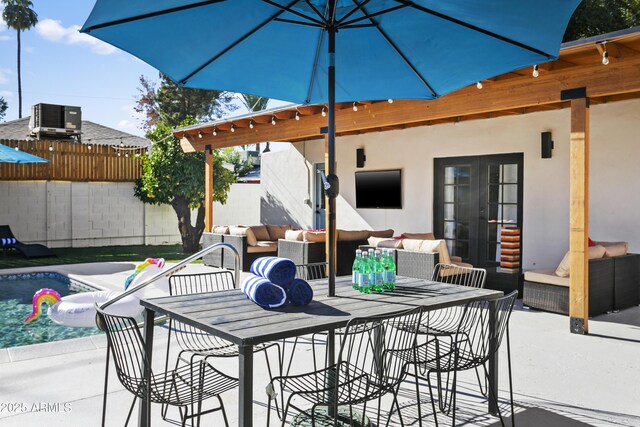 3139 N 40th St, Phoenix, AZ 85018 - view of patio with french doors, central air condition unit, and an outdoor living space
