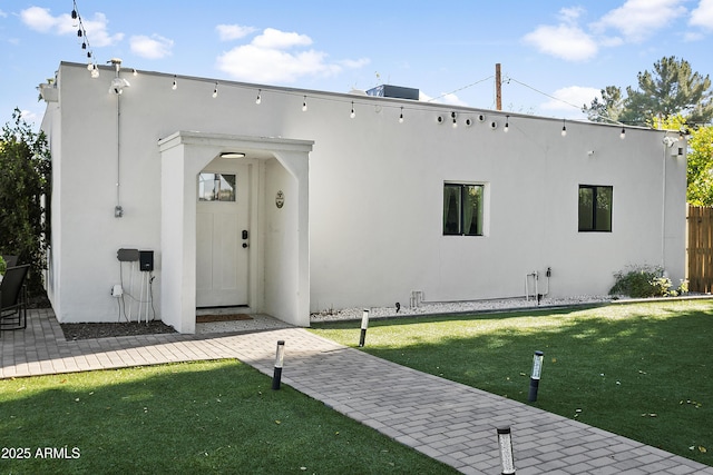 3139 N 40th St, Phoenix, AZ 85018 - view of front of house with stucco siding and a front yard