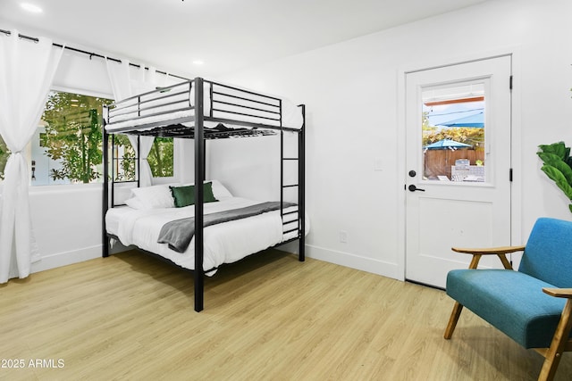 3139 N 40th St, Phoenix, AZ 85018 - bedroom featuring baseboards, light wood-style flooring, and recessed lighting
