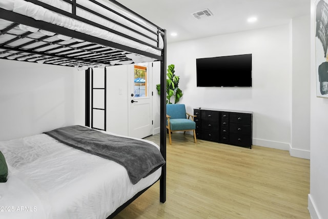 3139 N 40th St, Phoenix, AZ 85018 - bedroom featuring wood finished floors, baseboards, and recessed lighting
