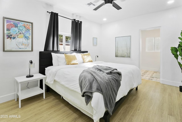 3139 N 40th St, Phoenix, AZ 85018 - bedroom featuring light wood-style flooring, baseboards, recessed lighting, and a ceiling fan