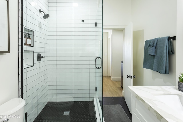 3139 N 40th St, Phoenix, AZ 85018 - full bath featuring a shower stall, toilet, vanity, and tile patterned flooring