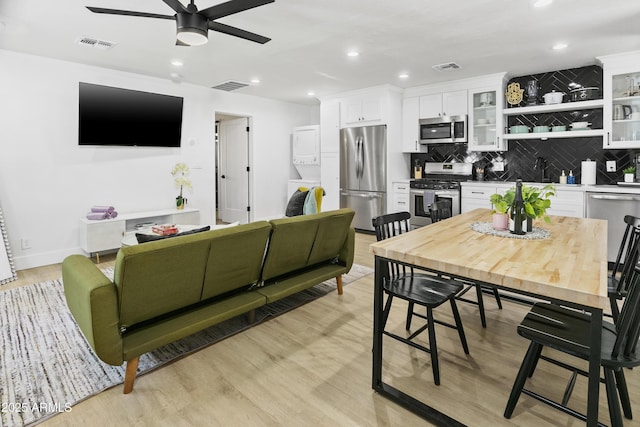 3139 N 40th St, Phoenix, AZ 85018 - dining area featuring ceiling fan, light wood-style flooring, recessed lighting, and baseboards