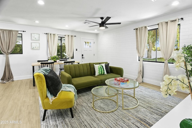 3139 N 40th St, Phoenix, AZ 85018 - living room featuring light wood-style flooring, a ceiling fan, baseboards, and recessed lighting