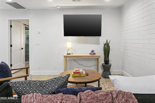 3139 N 40th St, Phoenix, AZ 85018 - living area featuring wood finished floors and baseboards